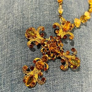 Signed VCLM large cross pendant on chain beaded necklace. Amber crystals on gold